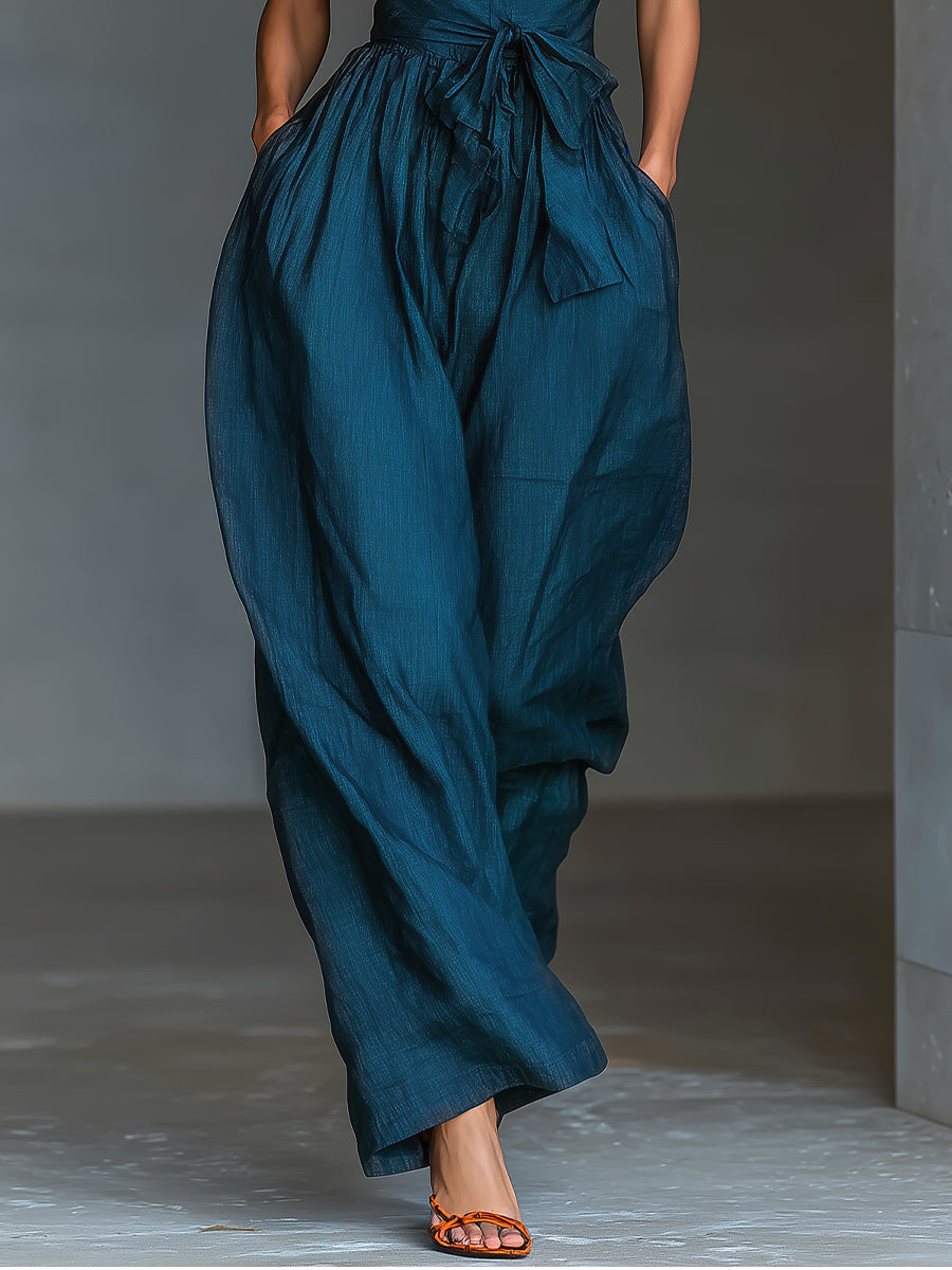Venusta | Mono azul marino con escote halter cruzado y pierna amplia