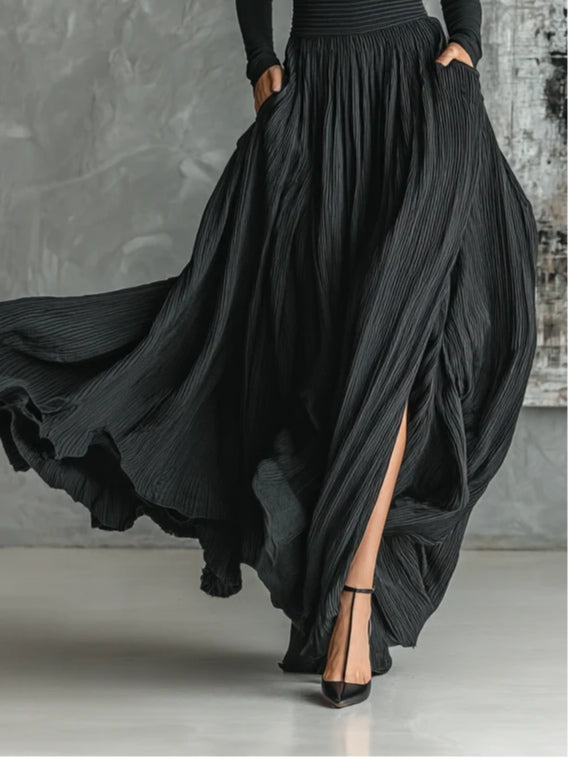 Prudence | Conjunto de falda plisada y jersey negro de cuello alto